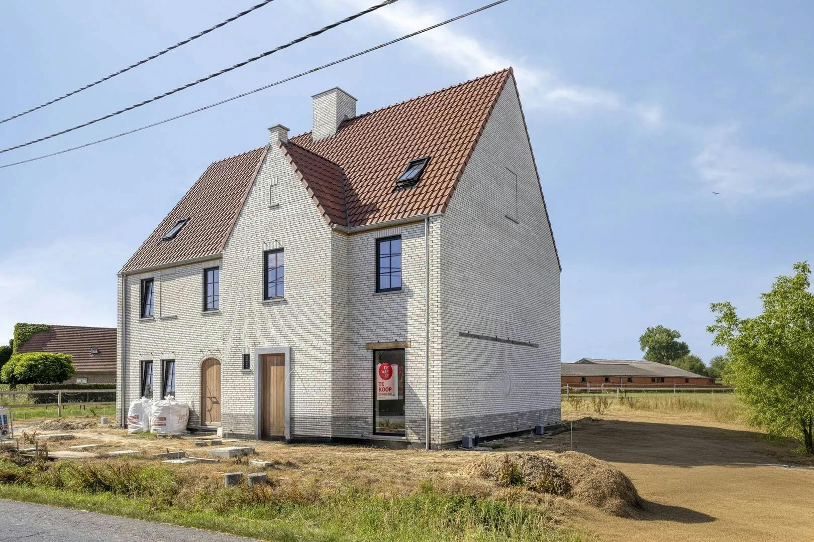 Landelijke nieuwbouwwoning met 3 kamers te koop in Avelgem foto {{pictureIndex}}