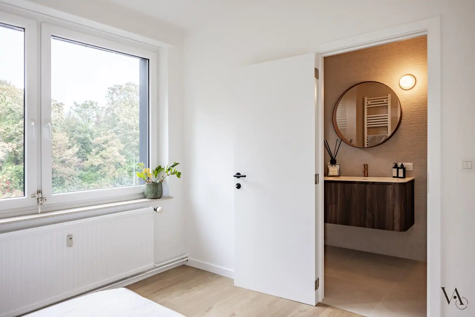 Zonnig hoekappartement met 2 slaapkamers op toplocatie in Leuven foto 11
