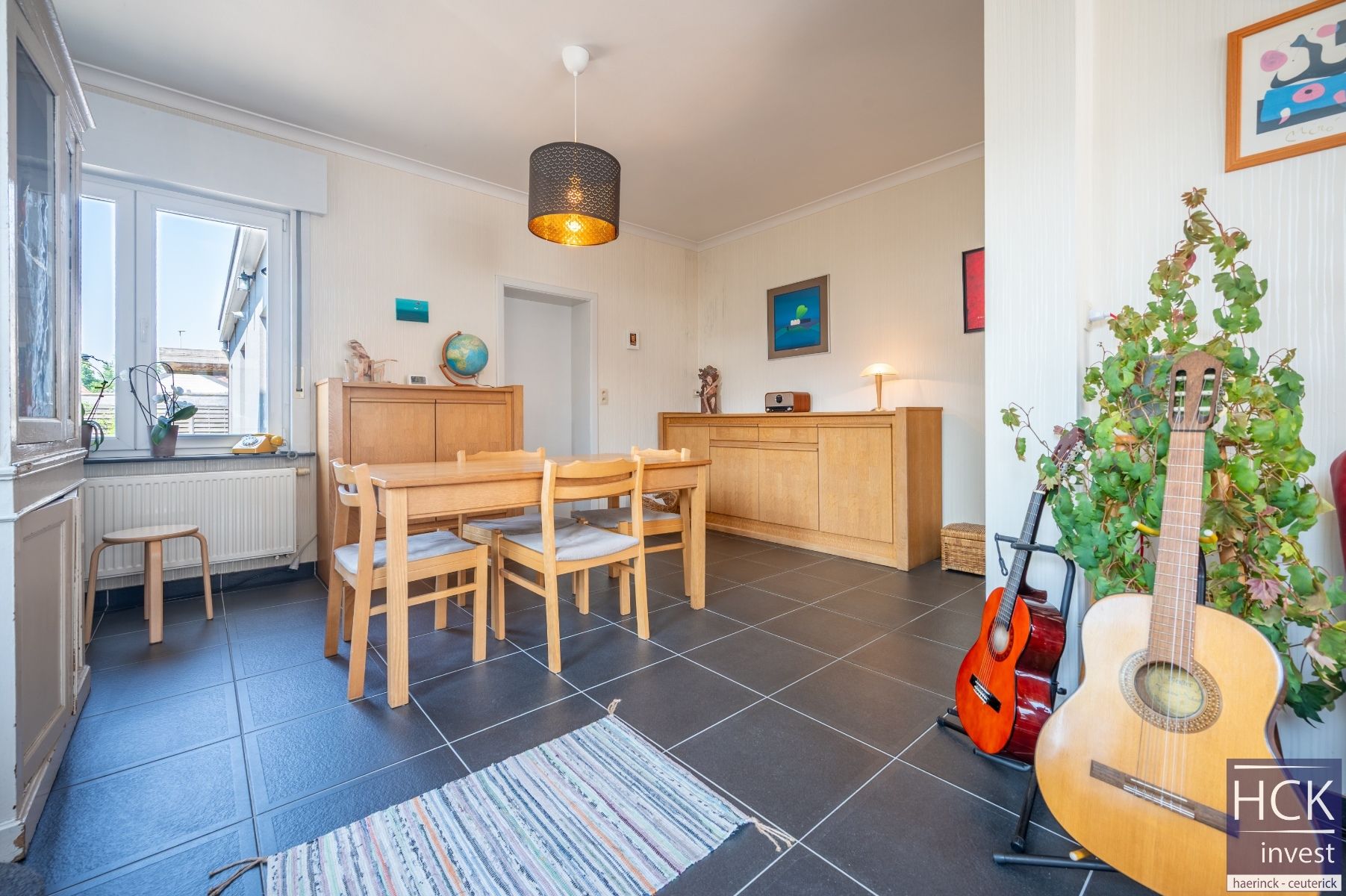 DEINZE - Instapklare woning met 2 SLPK. en tuin op topligging! foto 6