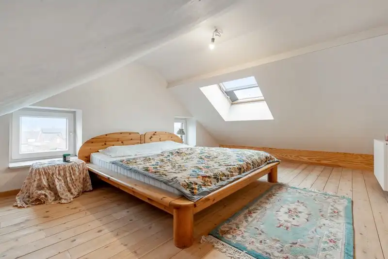 Handelsruimte met woonappartement in het centrum van Wommersom foto 21