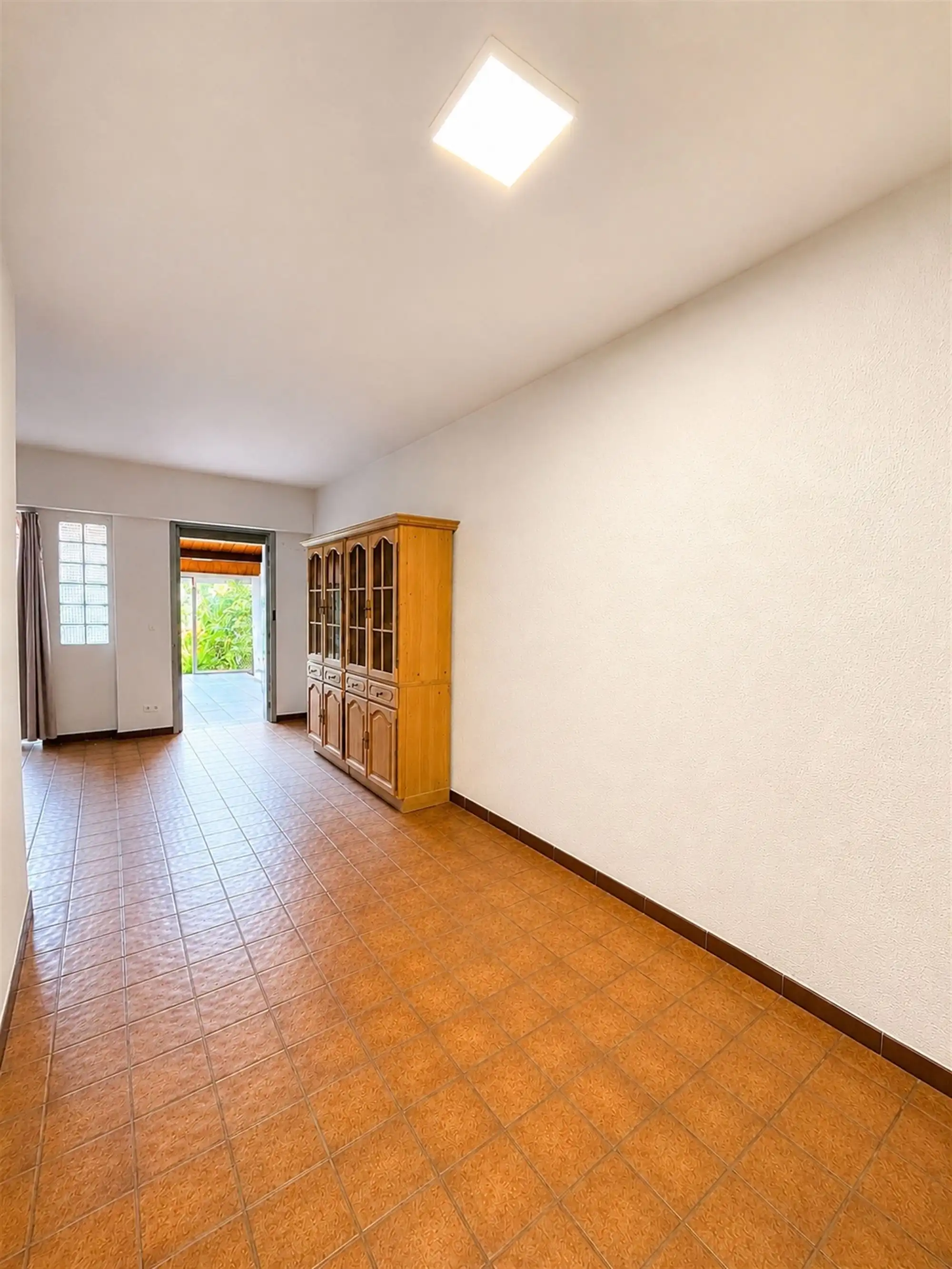 Gelijkvloers appartement met 400m² tuin foto 4