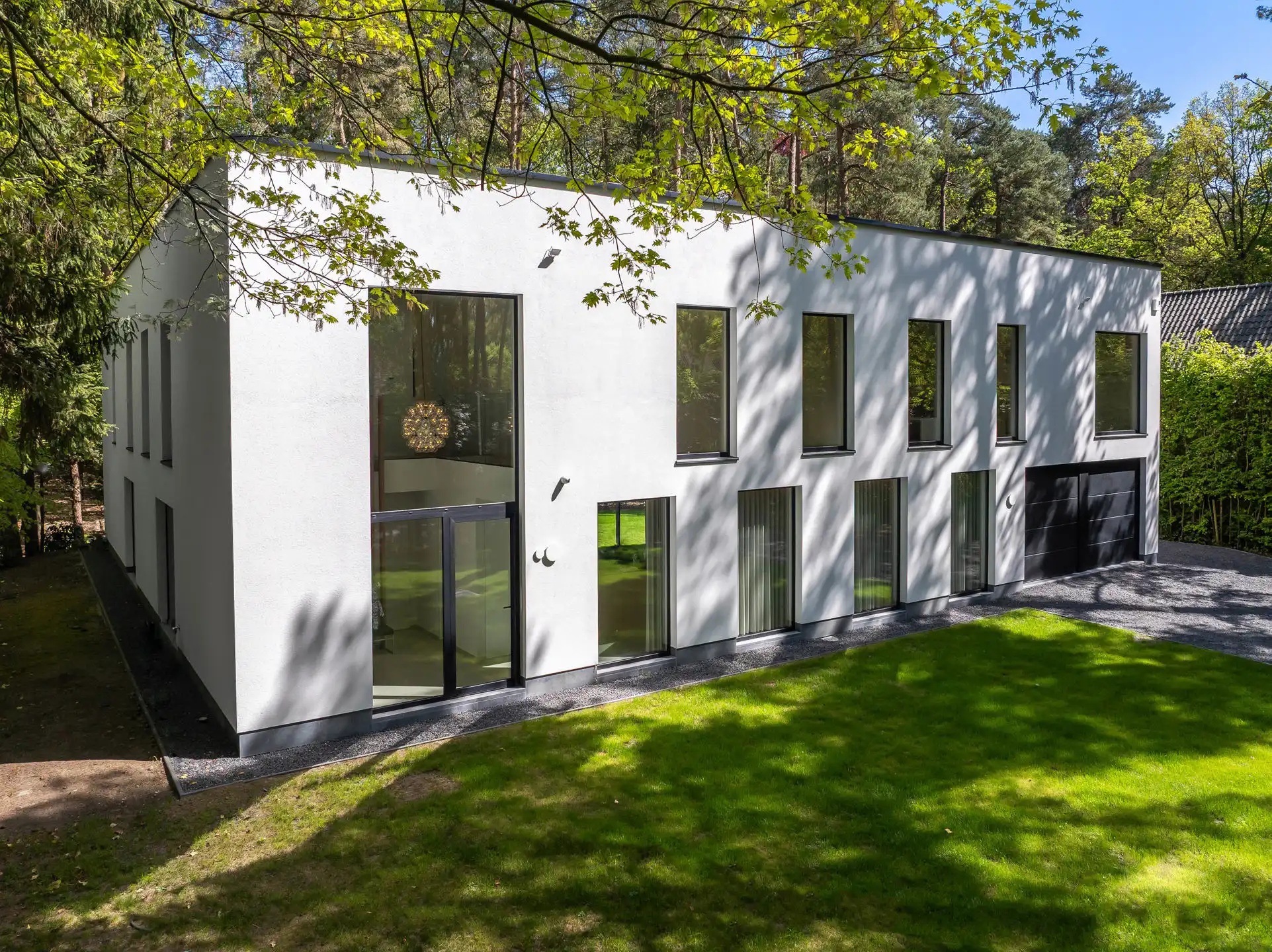 Exclusieve moderne villa waar natuur en perfectie samenkomen foto 4