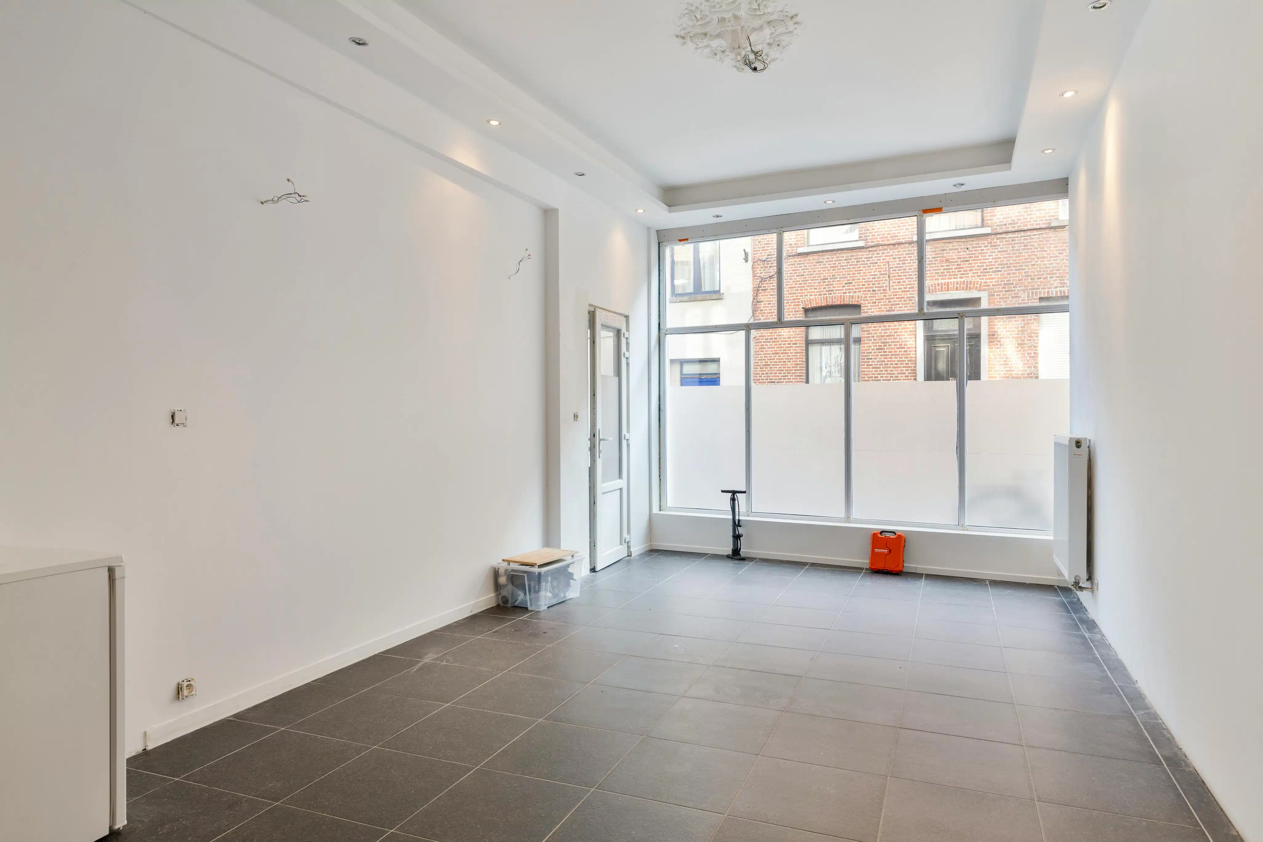 Karaktervol opbrengsteigendom te koop in Mechelen. foto {{pictureIndex}}