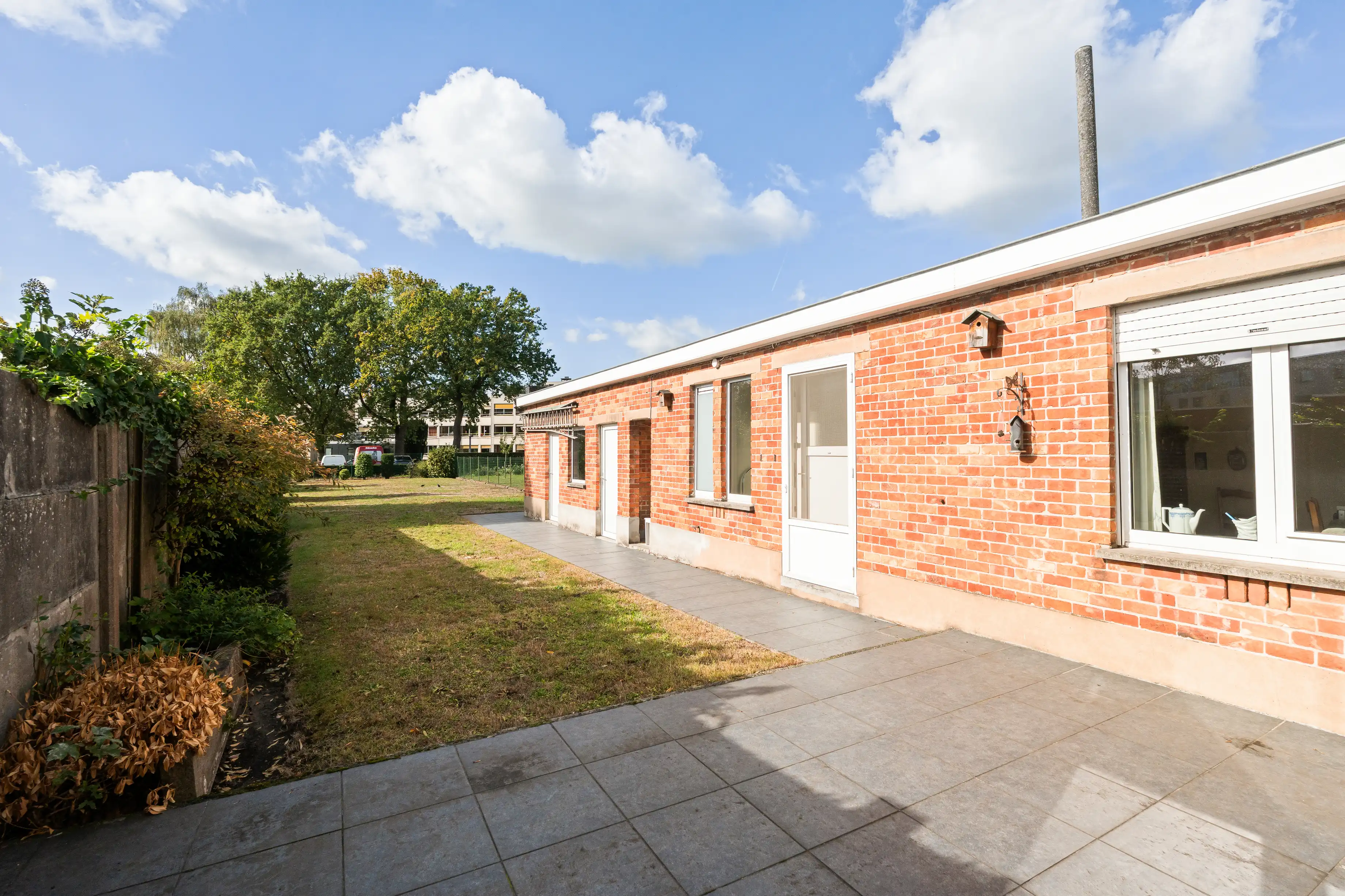 Ruime halfopen bebouwing met handelsruimte in Evergem foto 4