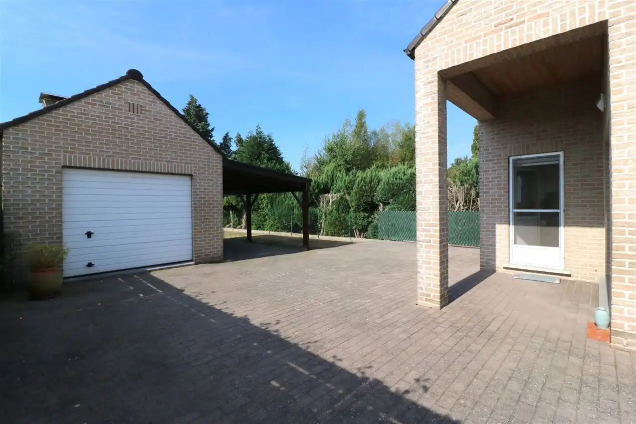 Gusting gelegen woning met 3 slp, garage en tuin foto 30