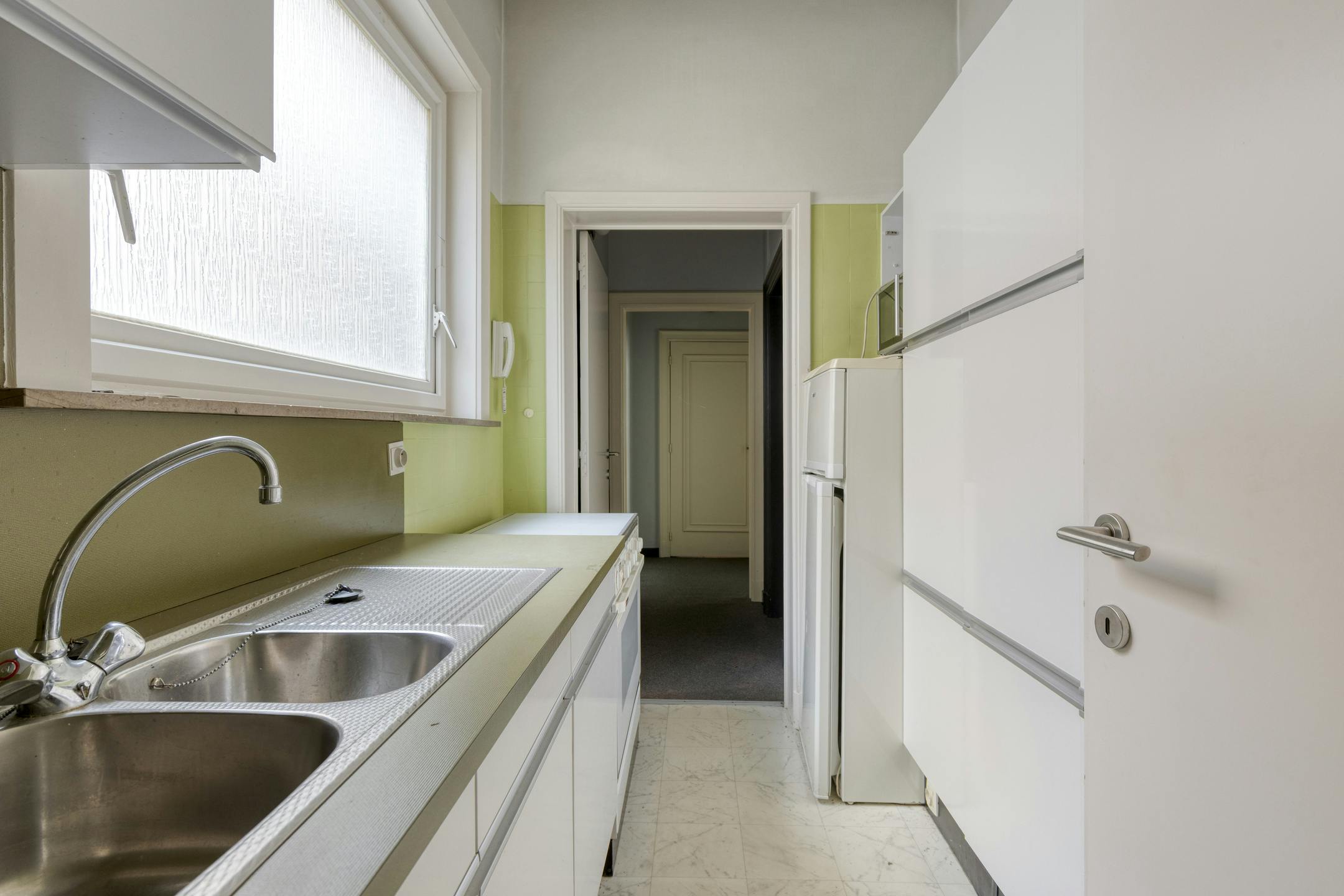 Patrimoniumvennootschap met handelspand en 2 appartementen foto 17