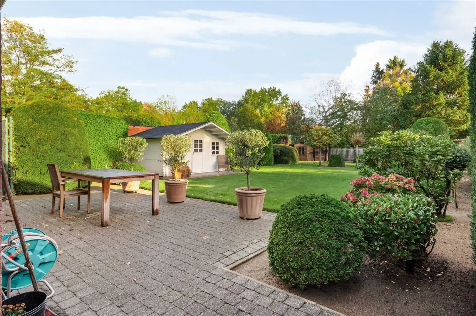 Prima onderhouden woning met 4 slaapkamers en prachtige tuin. foto 5