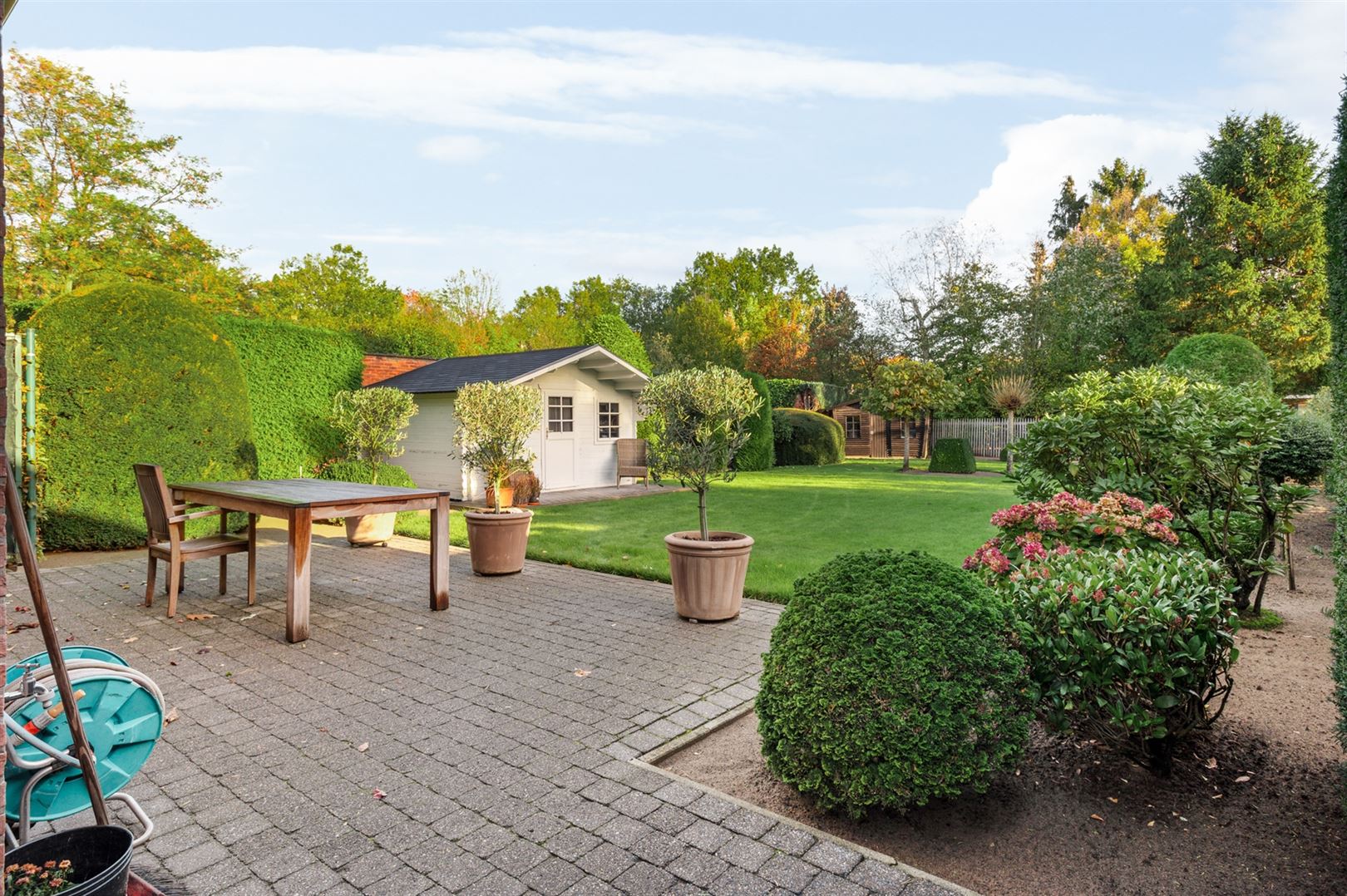 Prima onderhouden woning met 4 slaapkamers en prachtige tuin. foto 5