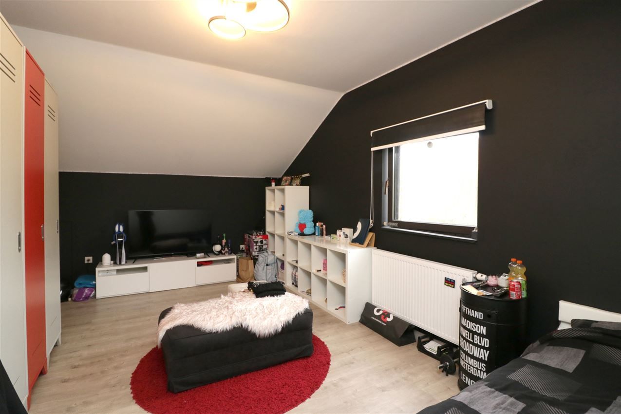 Gezellige woning, 4 slpk., inpandige garage, tuin foto 24