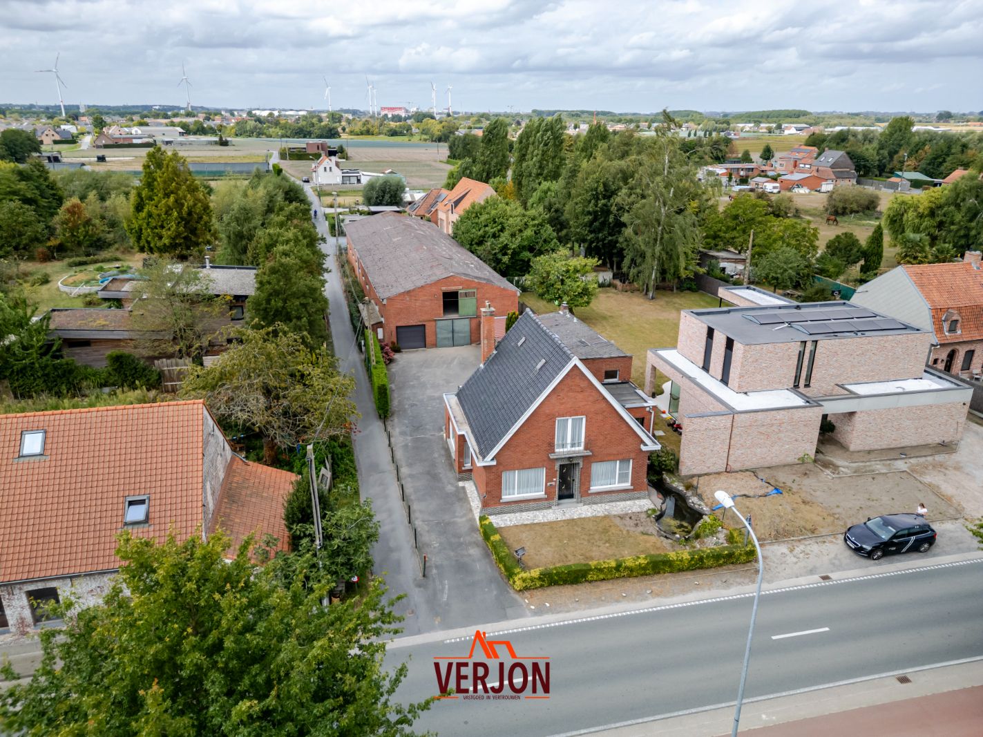Hoofdfoto van de publicatie: Alleenstaande woning met 440 m² opslagruimte in Kachtem!