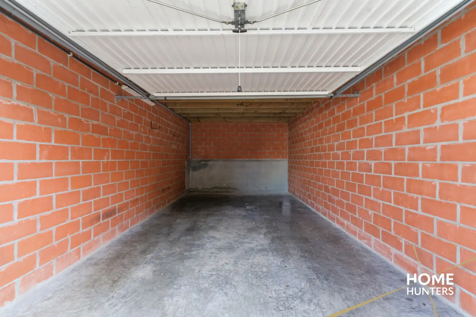 Instapklaar gelijkvloers appartement met 2 slaapkamers en ruime tuin foto 24