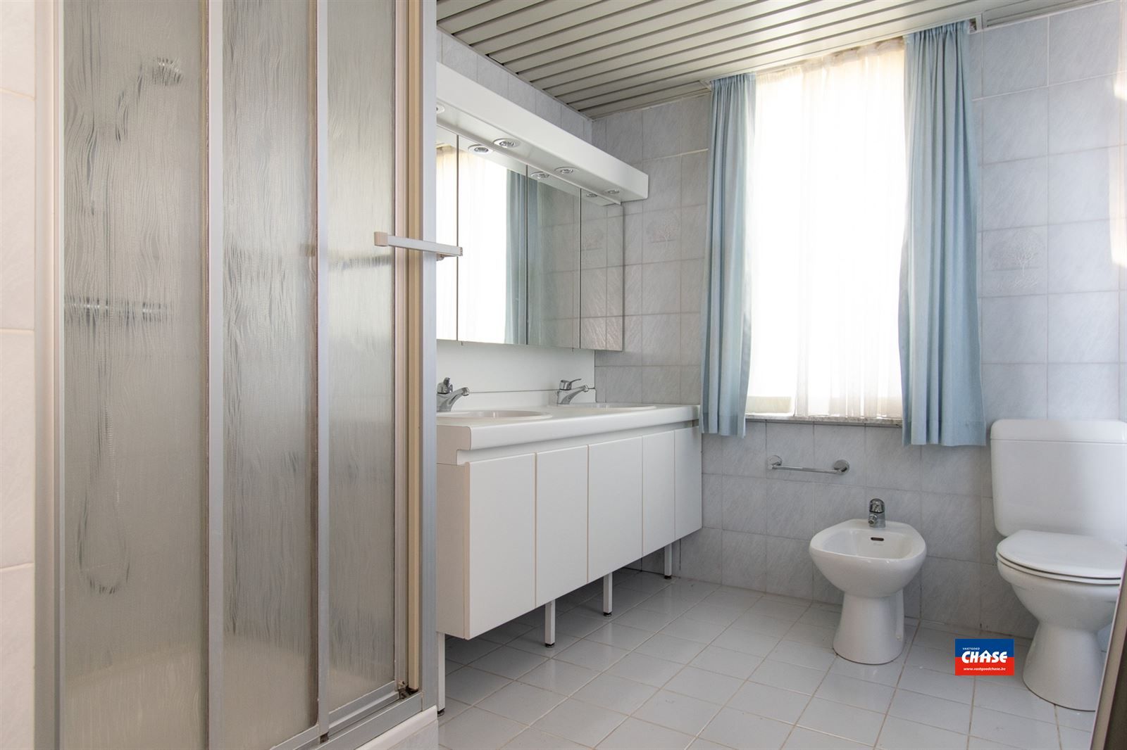 Rijwoning met 2 slpks, zolder en tuin foto 14