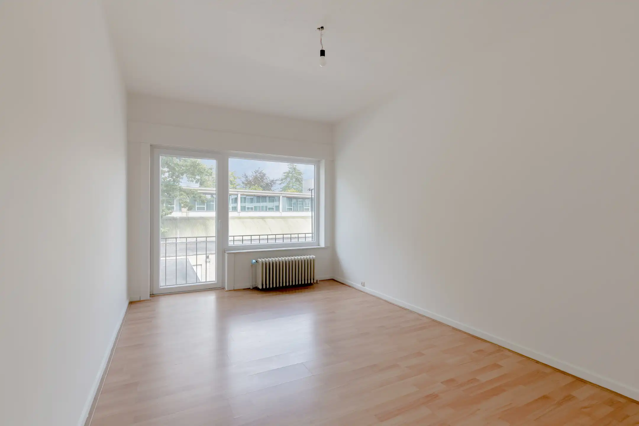 Vernieuwd 2-slaapkamer hoekappartement (98 m²) met garagebox foto 9