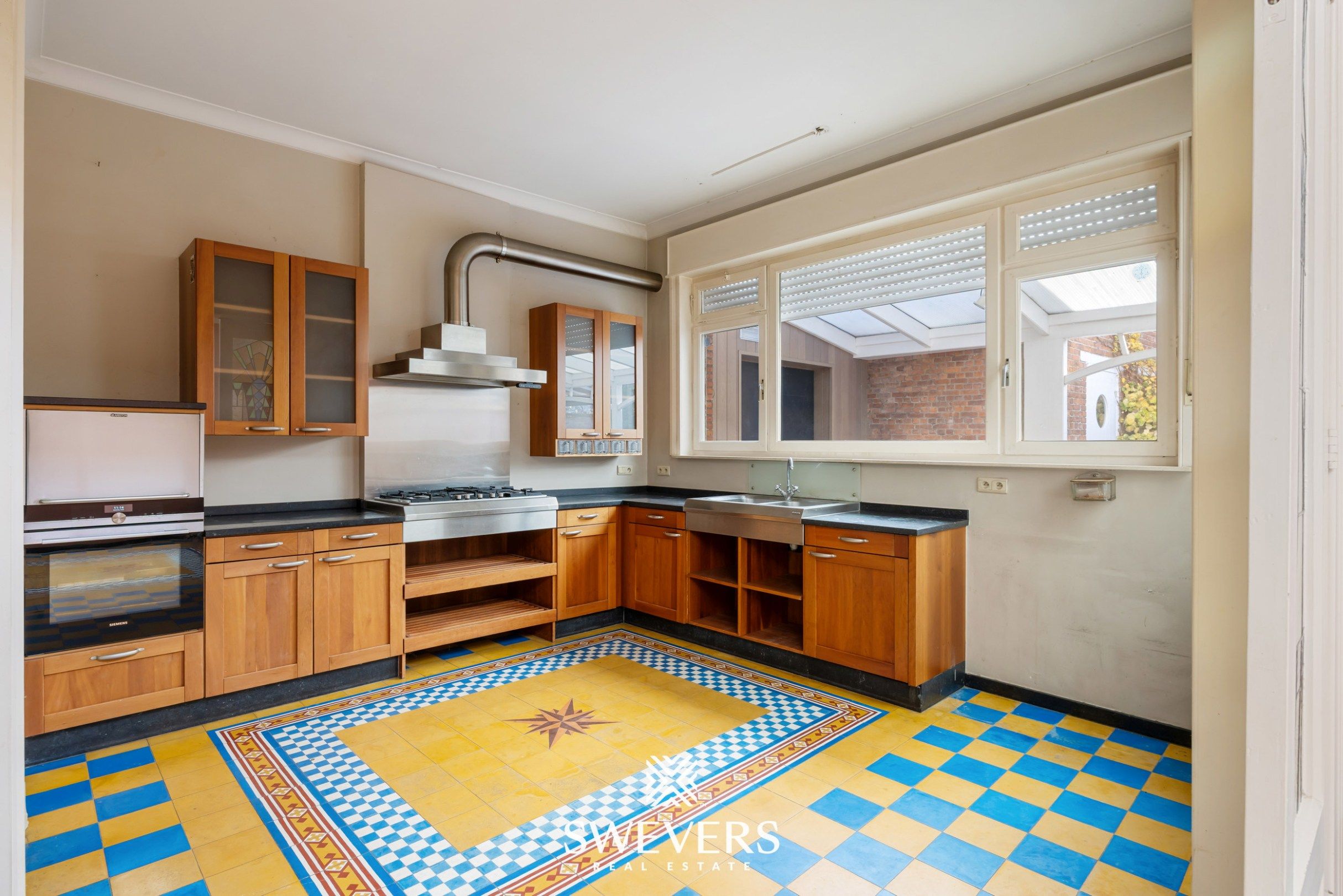 Karaktervol herenhuis met 6 slaapkamers, 2 badkamers en tuintje in Mol foto 14