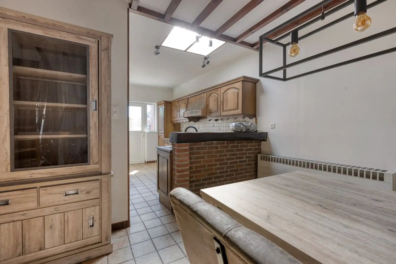 Gezellig ingerichte woning met hobbyruimte en tuin + toegang achterom foto 7