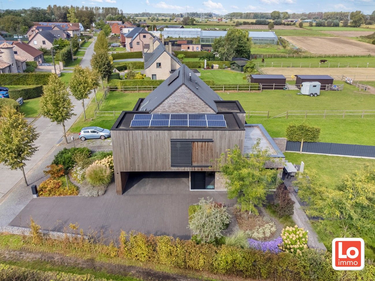 VERKOCHT!! Moderne energiezuinige halfopen bebouwing met twee overdekte autostaanplaatsen én open zicht op een landelijke locatie in Zaffelare. foto 28