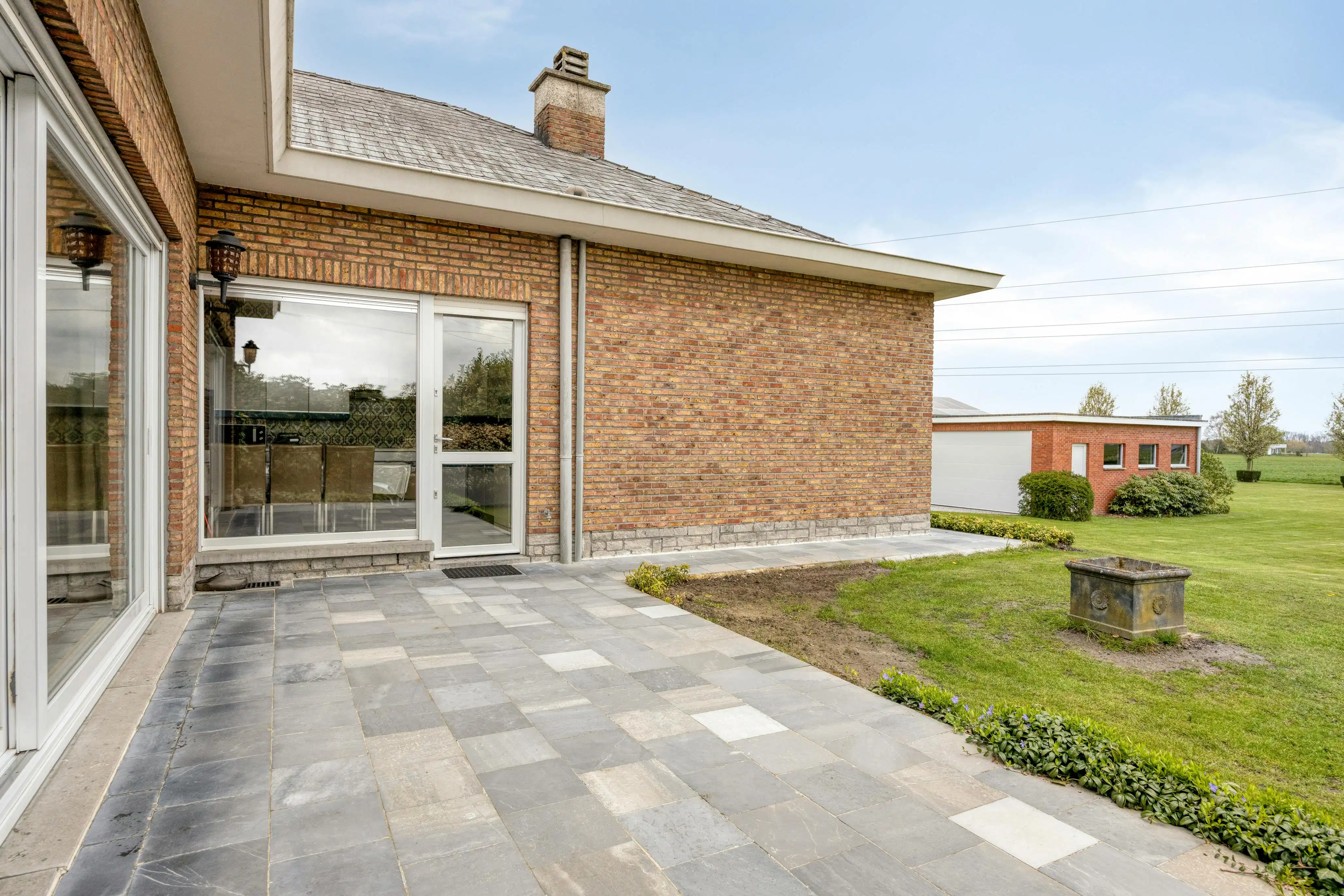 Landelijke laagbouw villa te koop in Reet op 2.500 m² foto 15