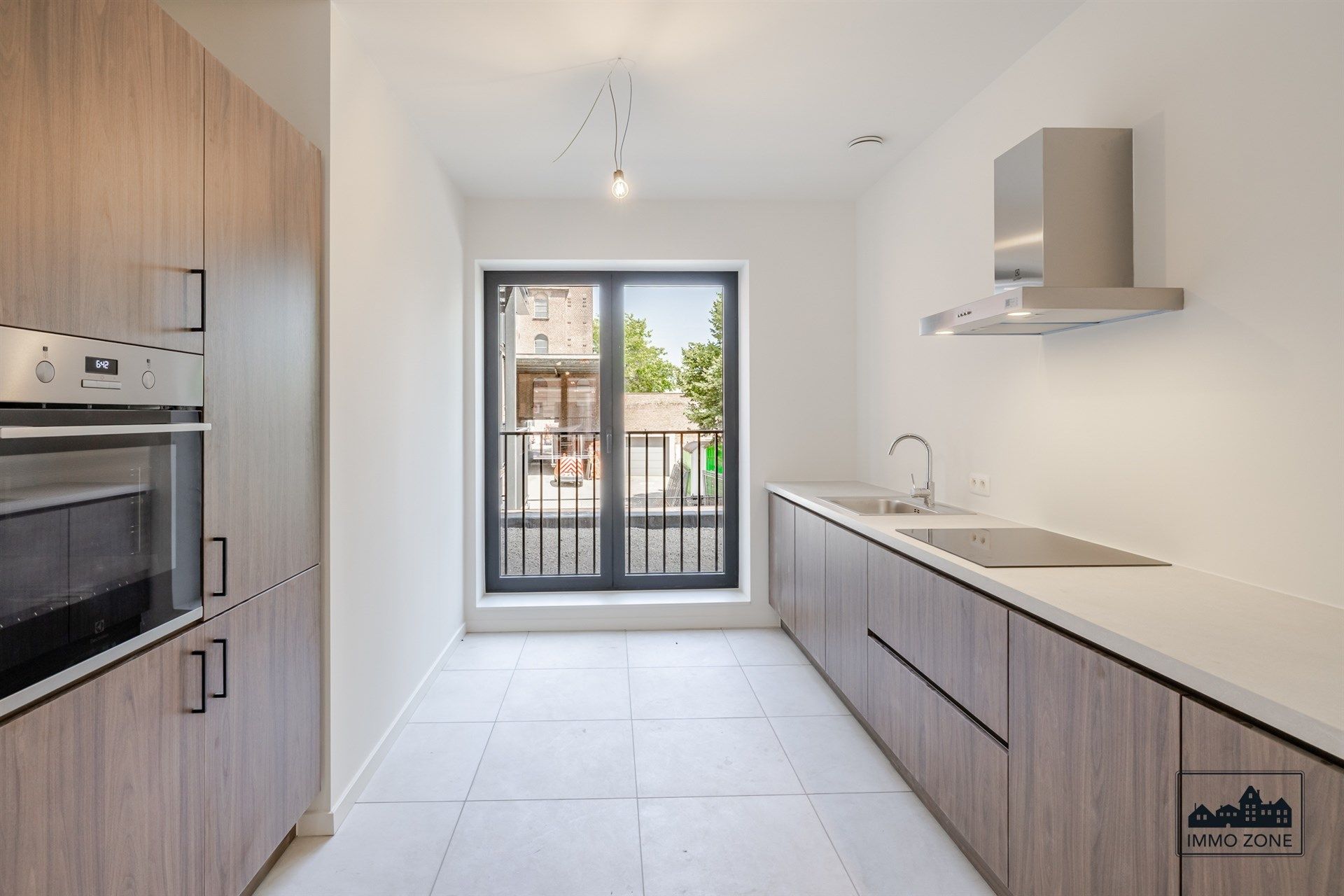 Afgewerkt nieuwbouwappartement met 2 slaapkamers foto {{pictureIndex}}