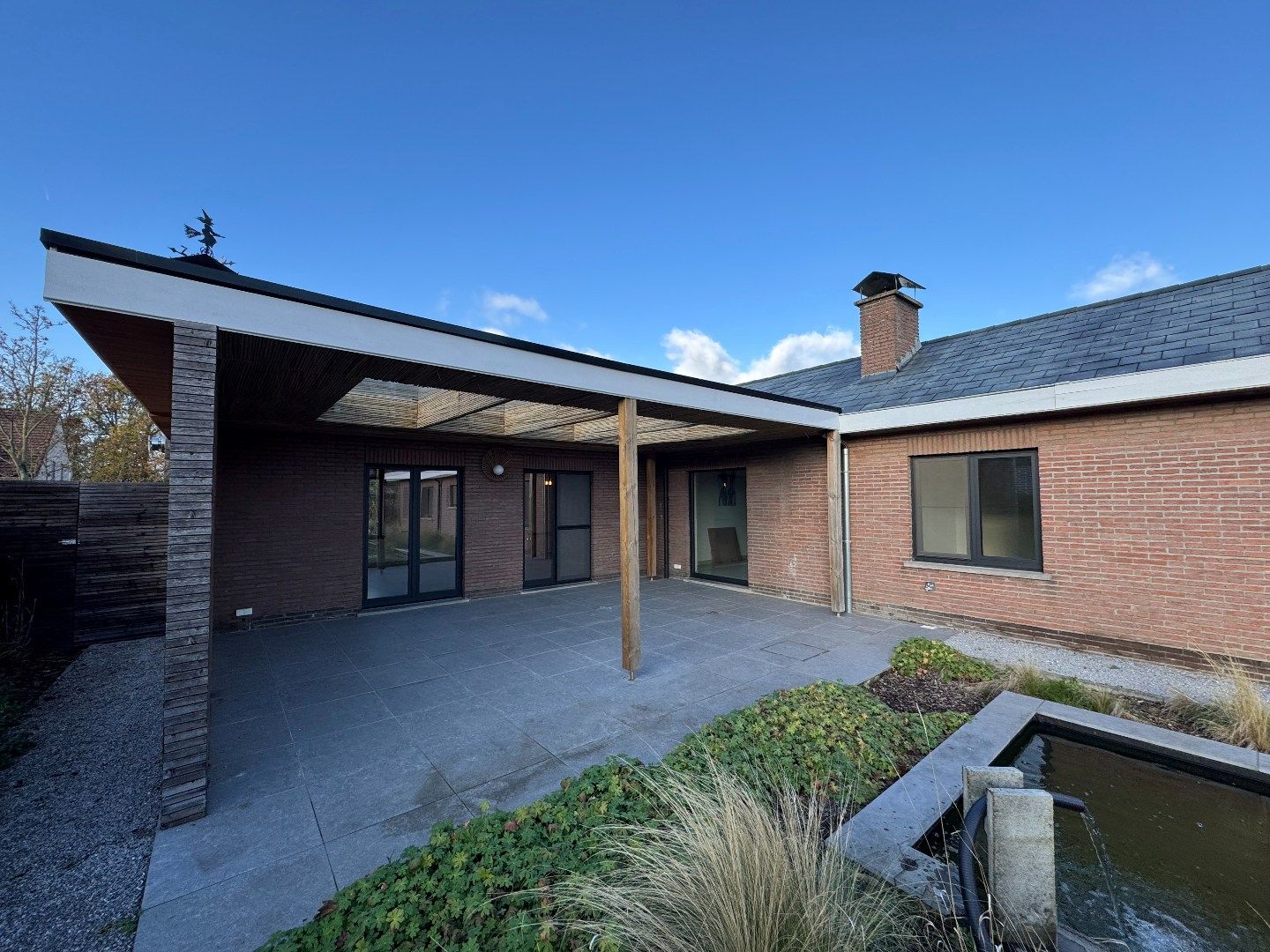 een instapklare 4-gevelwoning met tuin foto 13