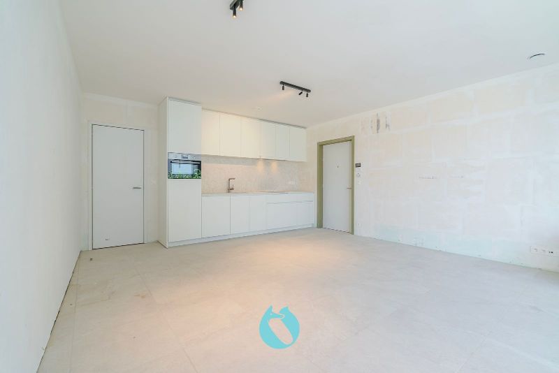 Green Square presenteert u 35 nieuwbouwappartementen en een winkelpand, letterlijk ónder de Kerktoren van Sleidinge. foto 3