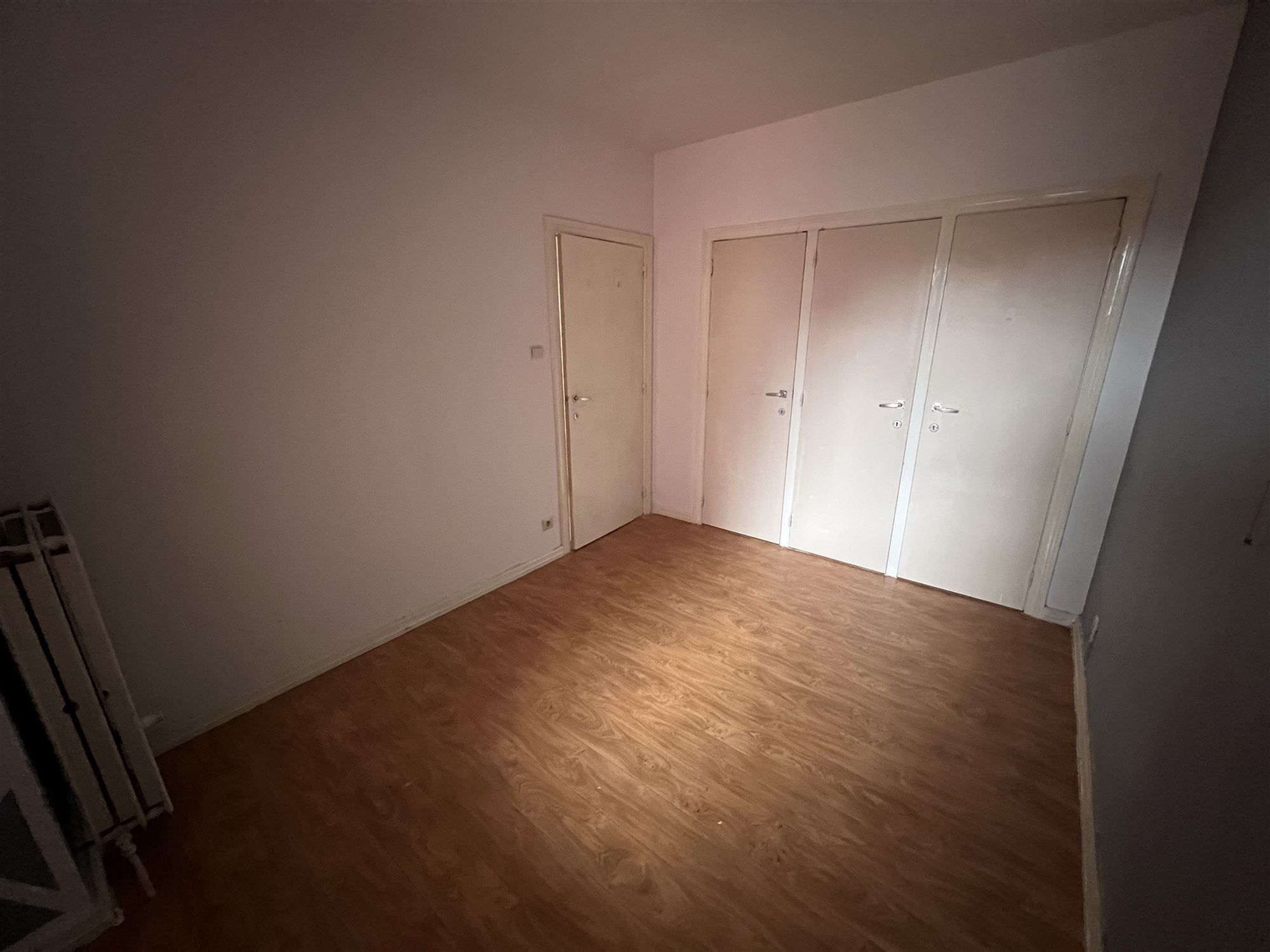 Opbrengsteigendom met 4 appartementen en tuin foto 11