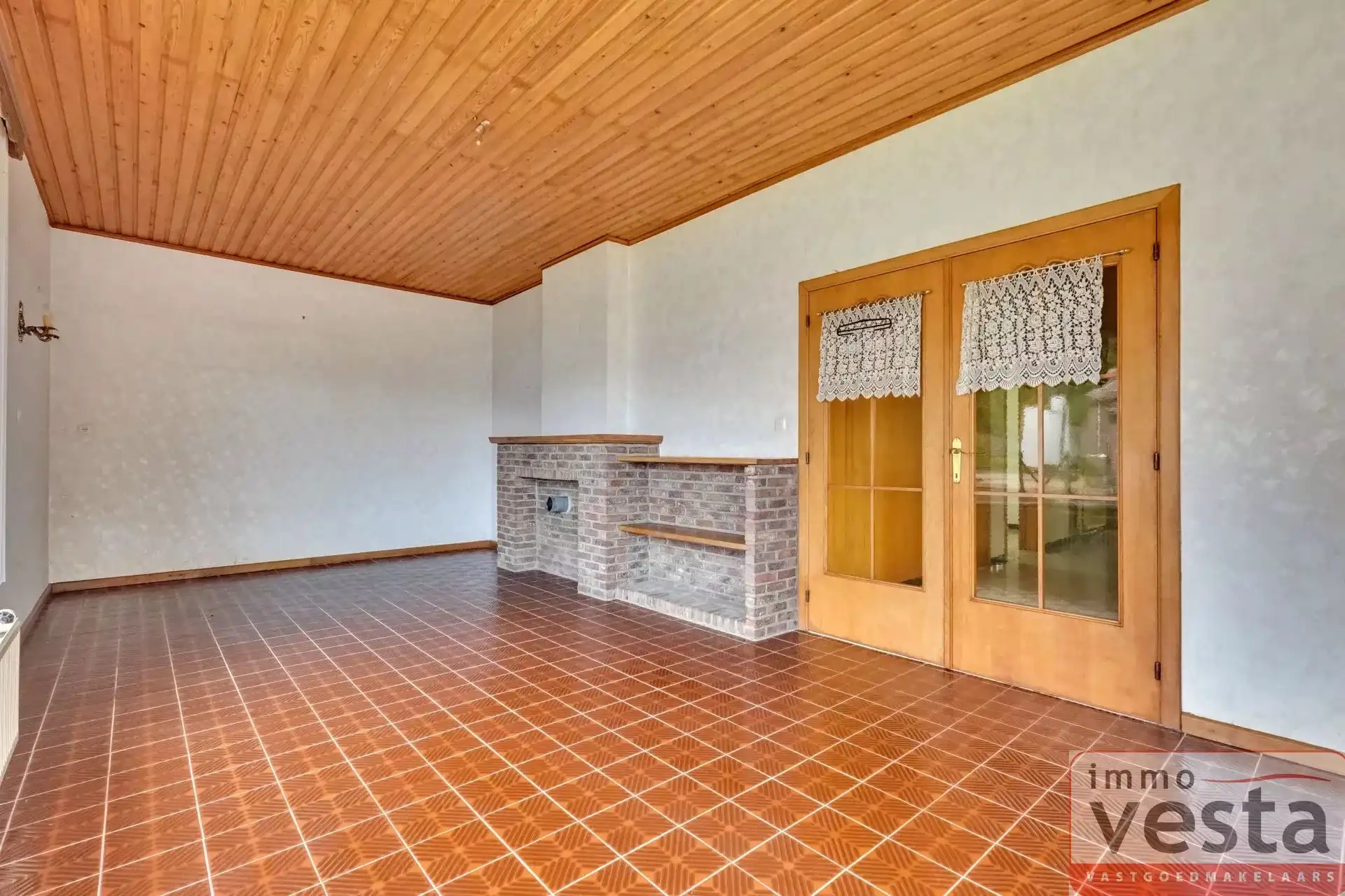 Bungalow met vier slaapkamers, inpandige garage en ruime tuin in Kortessem foto 3