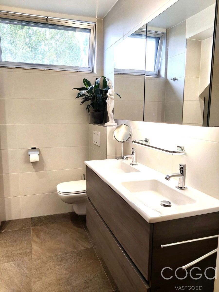 Woning met 4 slaapkamers, garage en tuin foto 17