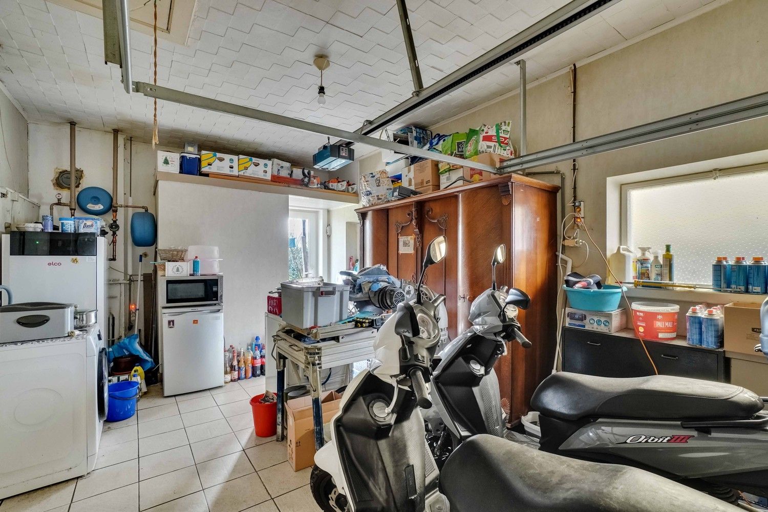 Bungalow met vier slaapkamers, inpandige garage en ruime tuin te koop in Kortessem foto 10