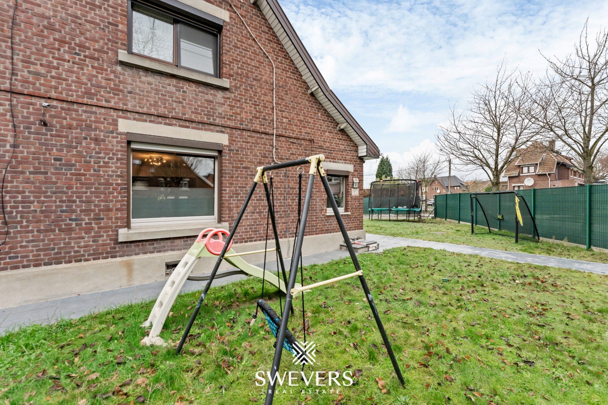 Instapklare gezinswoning met privacy en ideale ligging in Genk foto 27