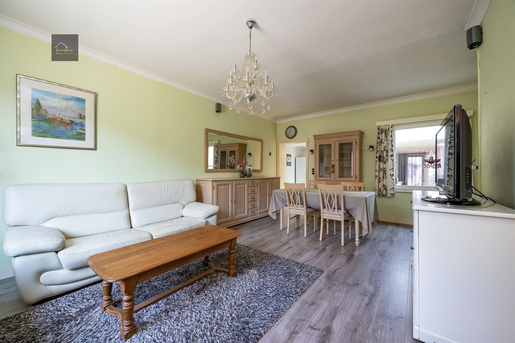 Te renoveren rijwoning met tuintje foto 3