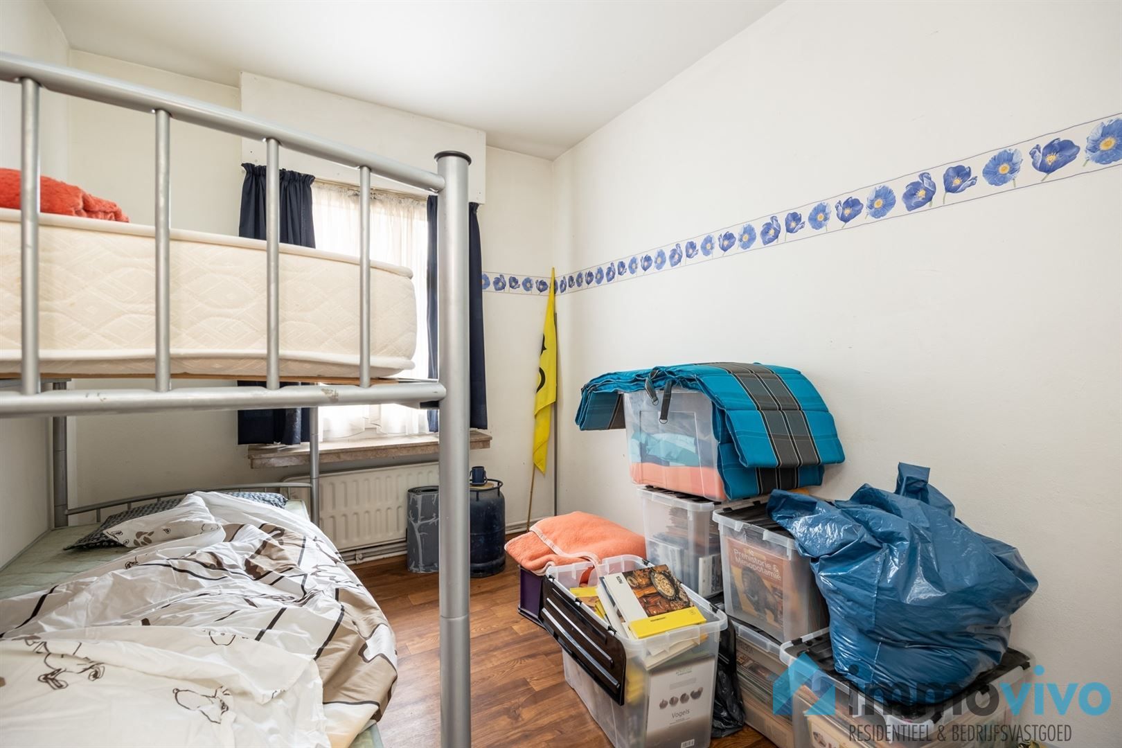 Ruim gelijkvloersappartement met 3 slpk's en koer foto 9