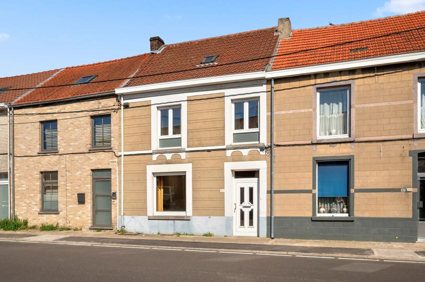 Op te frissen rijwoning op de Tiense stadsrand met tuin en 2 parkeerplaatsen foto 3