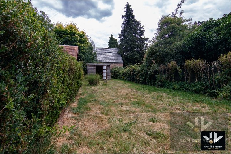 Instapklaar gelijkvloers appartement met ruime tuin te Tuilt foto 10
