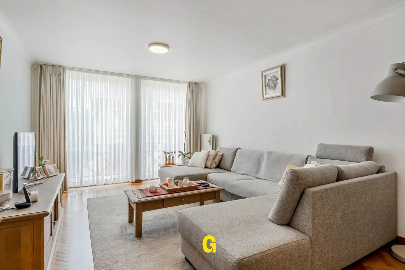 Uitstekend verzorgd 2-slaapkamer appartement in hartje Bilzen, met standplaats, kelderberging en terras met zicht op het Park van Haffmans foto 10