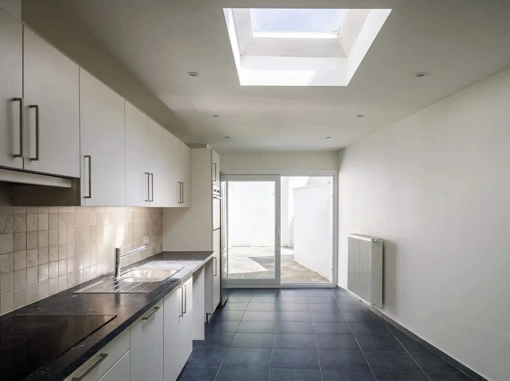 Instapklare woning met 4 kamers en koer in Gent foto 6