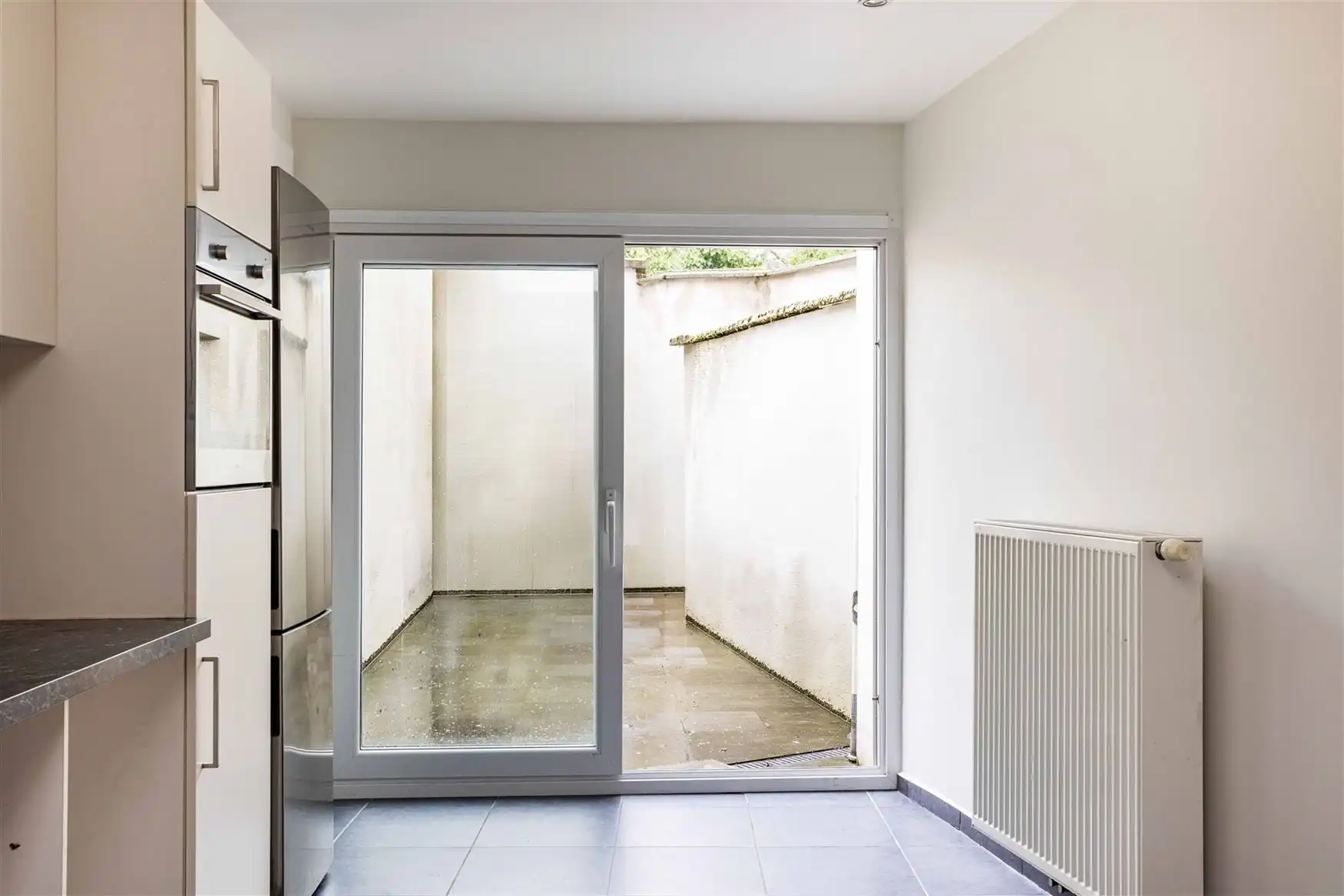 Instapklare woning met 4 kamers en koer in Gent foto 6