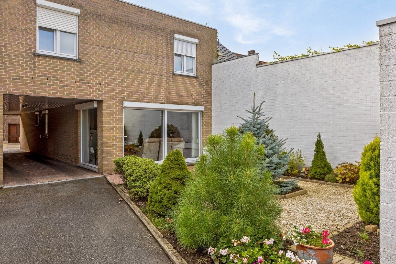 Heel aangenaam, lichtrijk gelijkvloers appartement met tuin én garage! foto 19