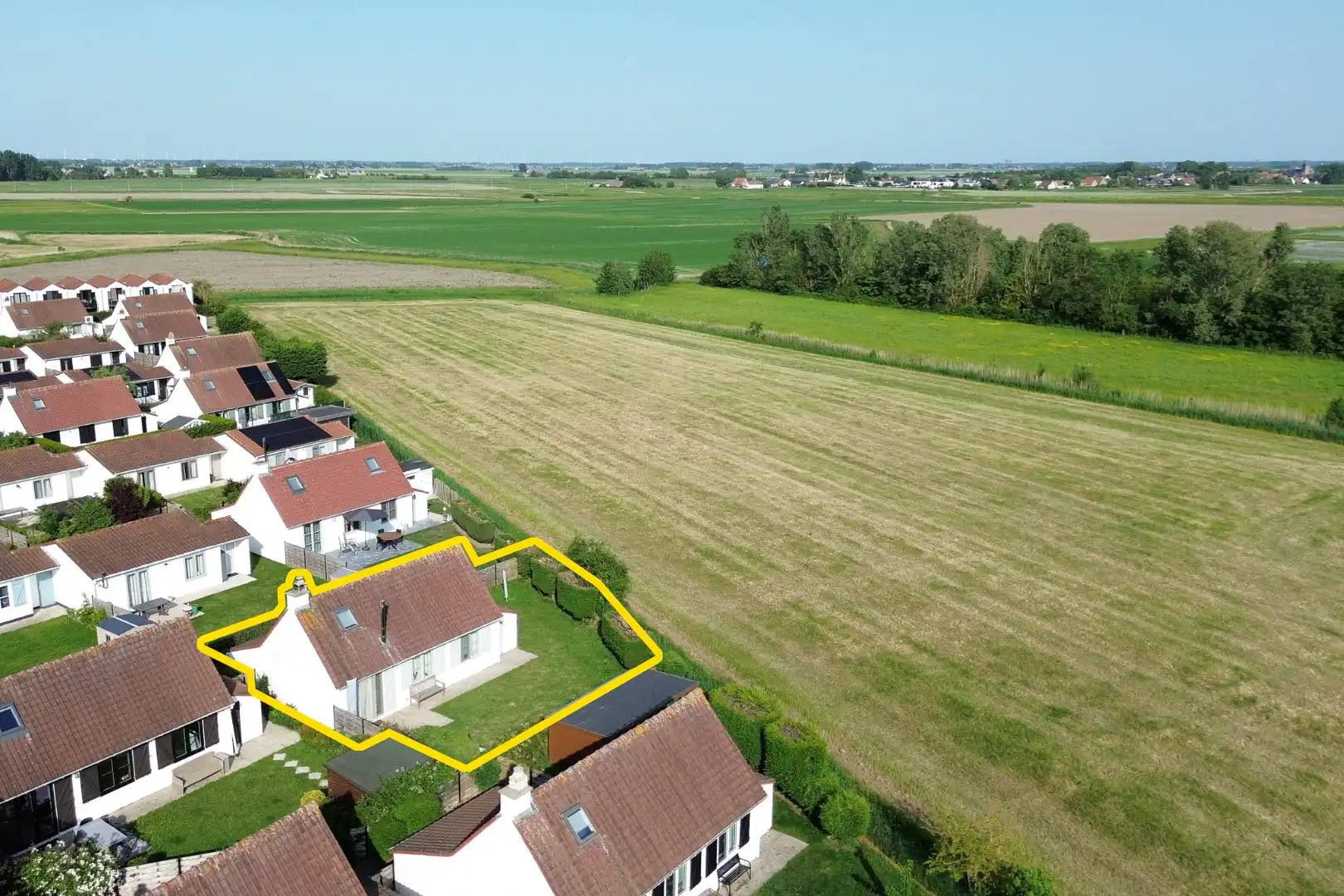 Charmant vissershuisje met 3 slaapkamers en prachtig open polderzicht foto 2