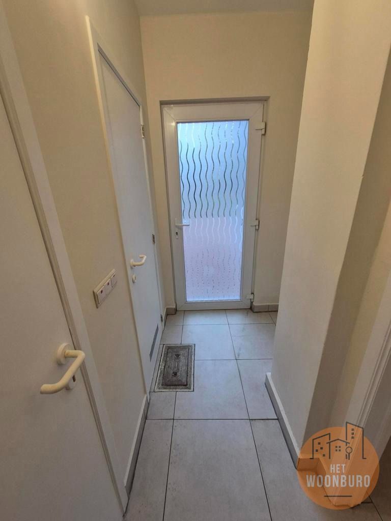 Gelijkvloers appartement met tuin foto 3