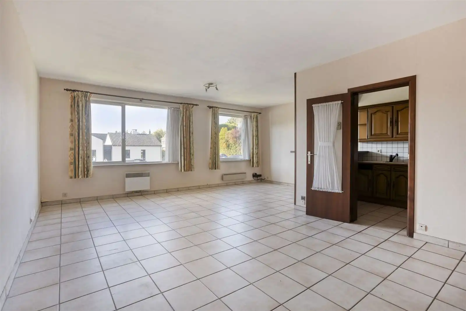 Super gelegen gelijkvloers appartement met voortuintje en garage foto 4