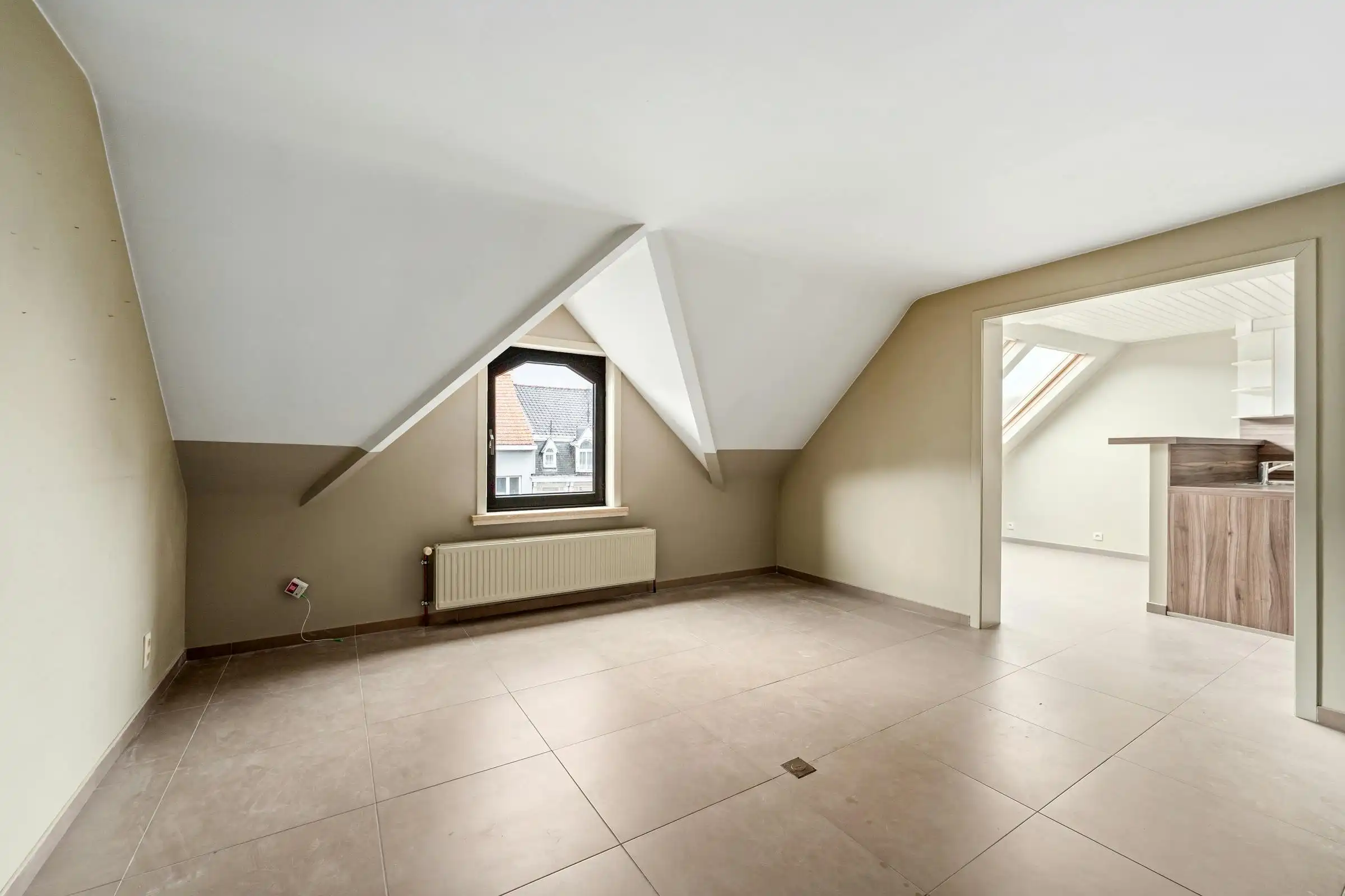 Dakappartement (81m²) met 1 slaapkamer in centrum Roeselare foto {{pictureIndex}}