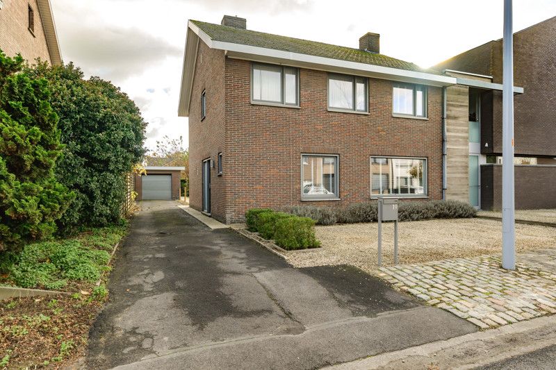 Halfopen woning te Tielt. foto {{pictureIndex}}