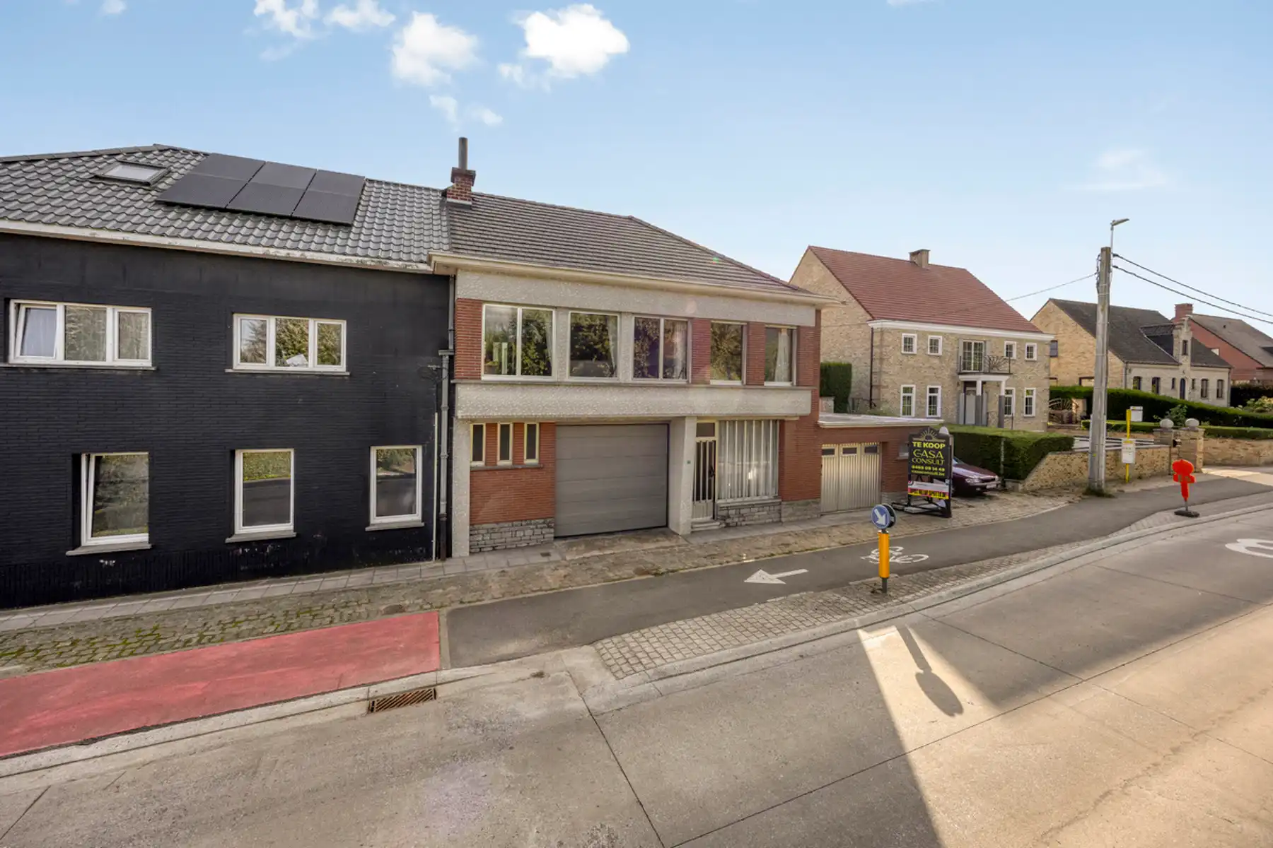 Halfopen bebouwing met ruime garage/werkplaats en tuin! foto 21