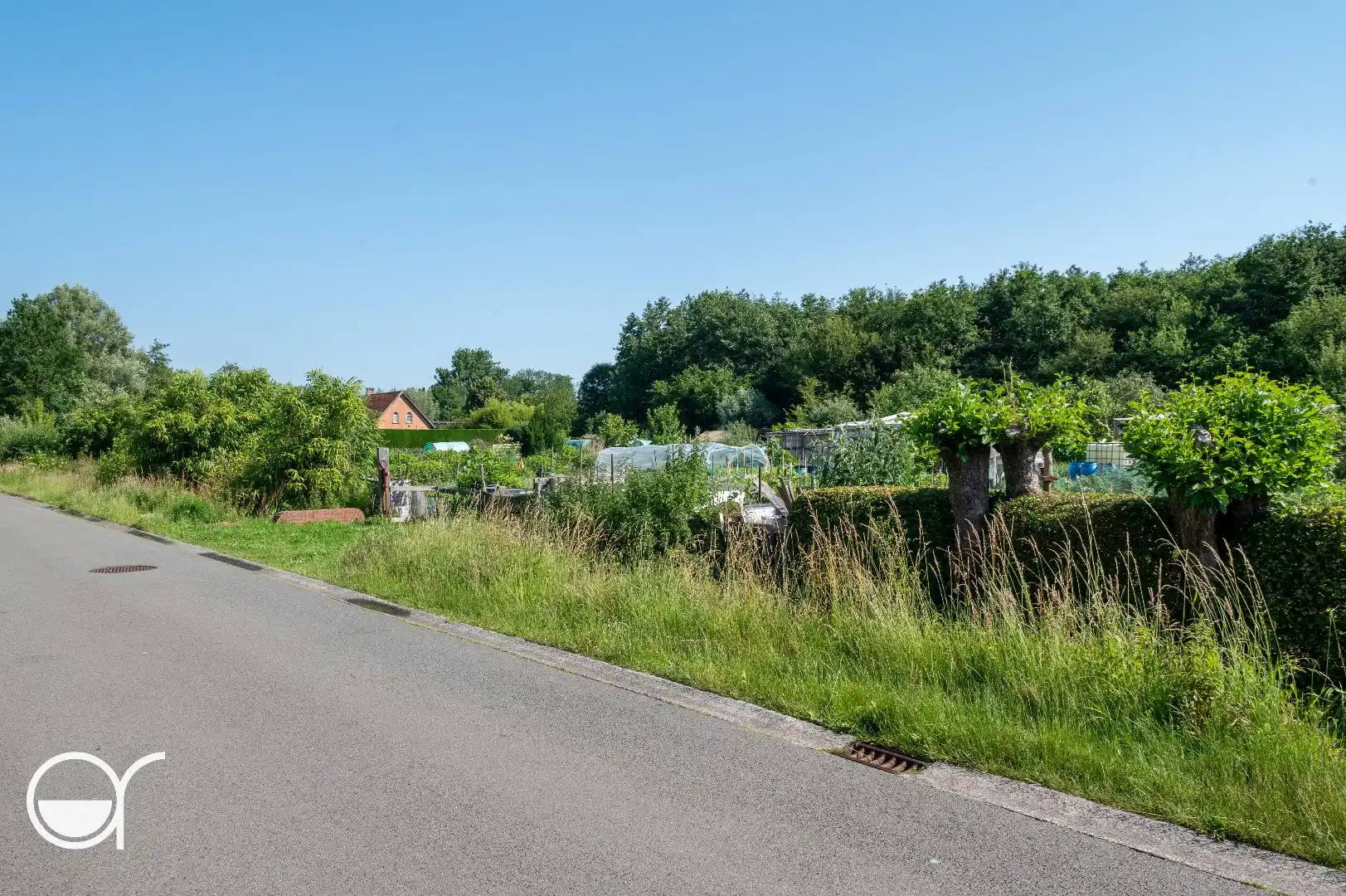 Landbouwgrond met 24 volkstuinen foto 5