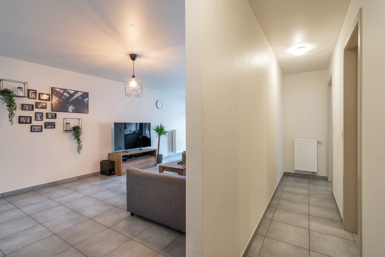 Degelijk appartement met 2 slaapkamers, standplaats en kelderberging op wandelafstand van de markt van Bilzen  foto 21