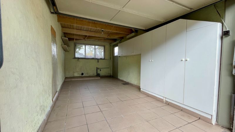 Charmante woning met garage en tuin foto 25