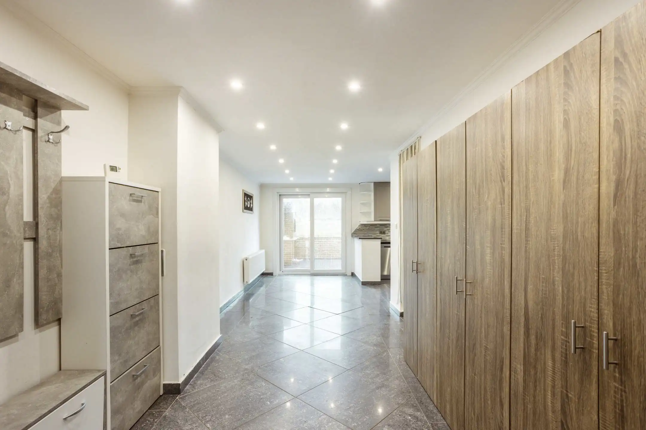 Ruime gezinswoning met aangename zuid-gerichte tuin. foto 8