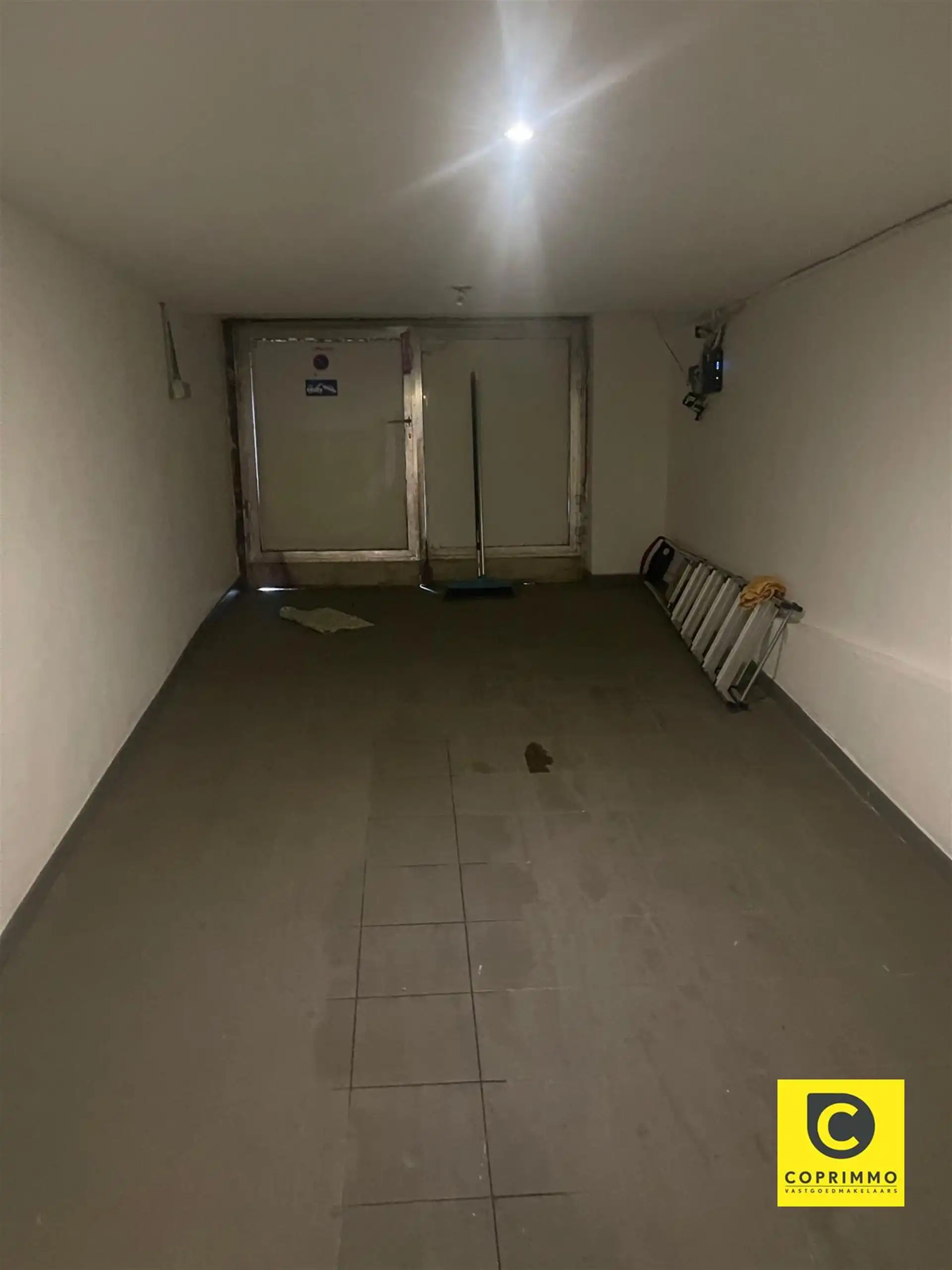 Te renoveren souterrain met stadskoer, achterhuis en garage op 't Zuid! foto 22