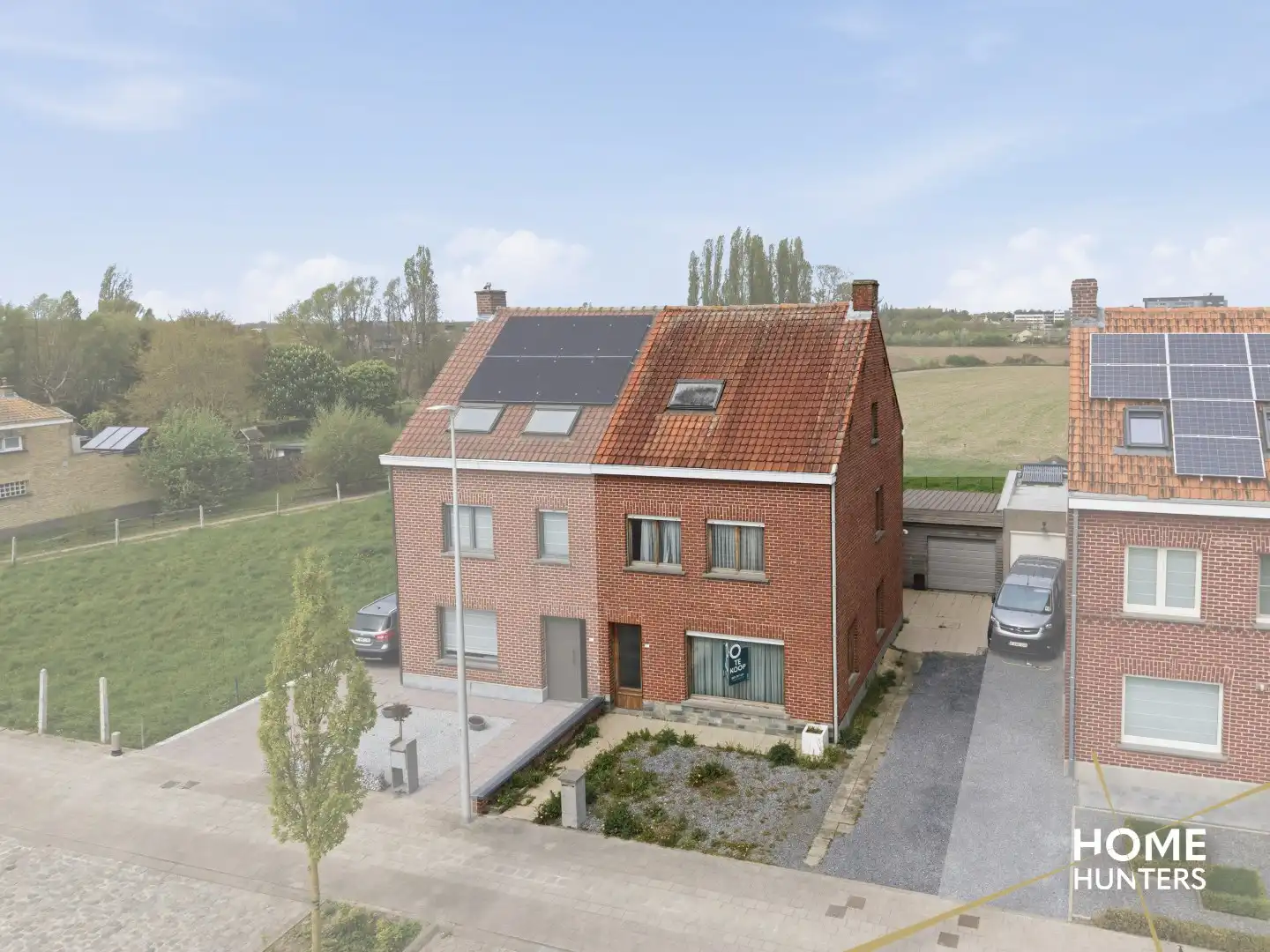 Halfopen te renoveren woning met 4 slaapkamers, ruime tuin en garage op gunstige locatie te Ieper foto 30