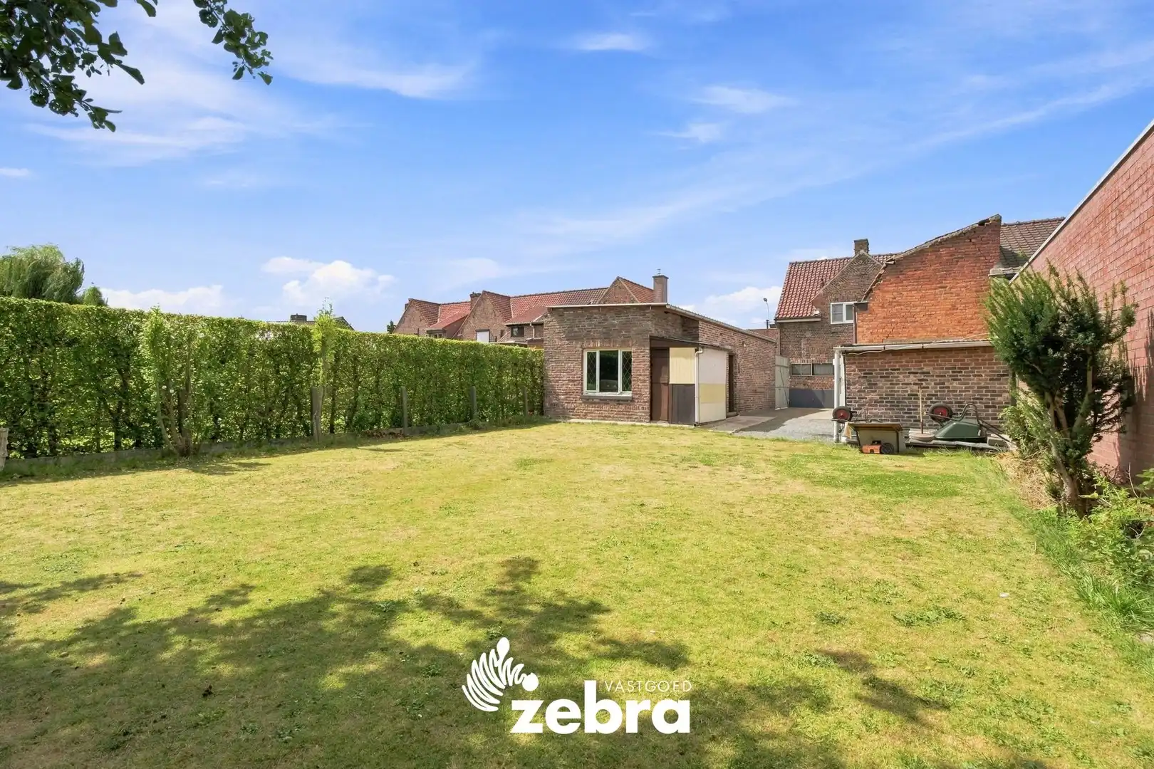 Halfopen woning in tuinwijk te koop in Roeselare! foto 2